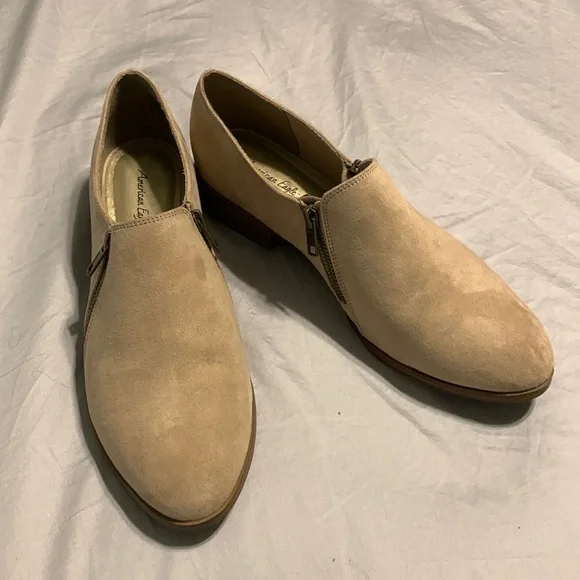 American Eagle by Payless size 11 slip on booties with small heel. Tan in color